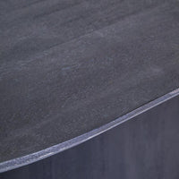 Black mango oval dining table on a white background zoom in view