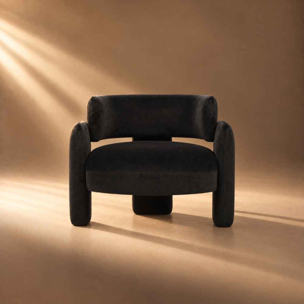 Furniture-statement-chair-joline-and-flo-Blaw-Black-Velvet-Curved-Chair-lifestyle
